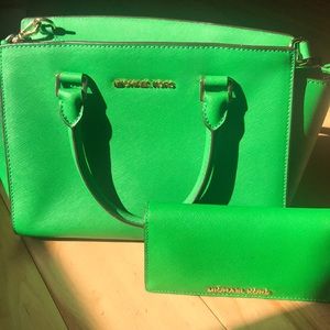 Michael Kors purse and wallet color green.